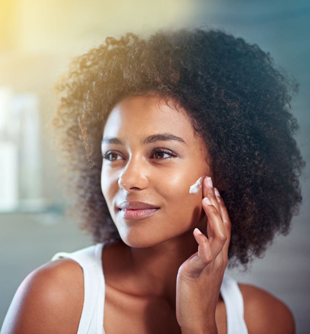 Woman with beautiful natural skin enjoying organic beauty routine